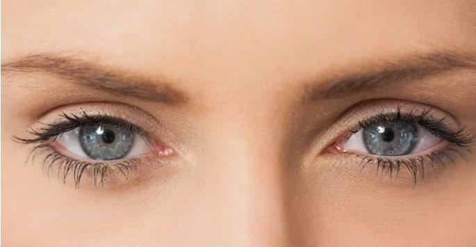 Close-up of a woman's blue eyes