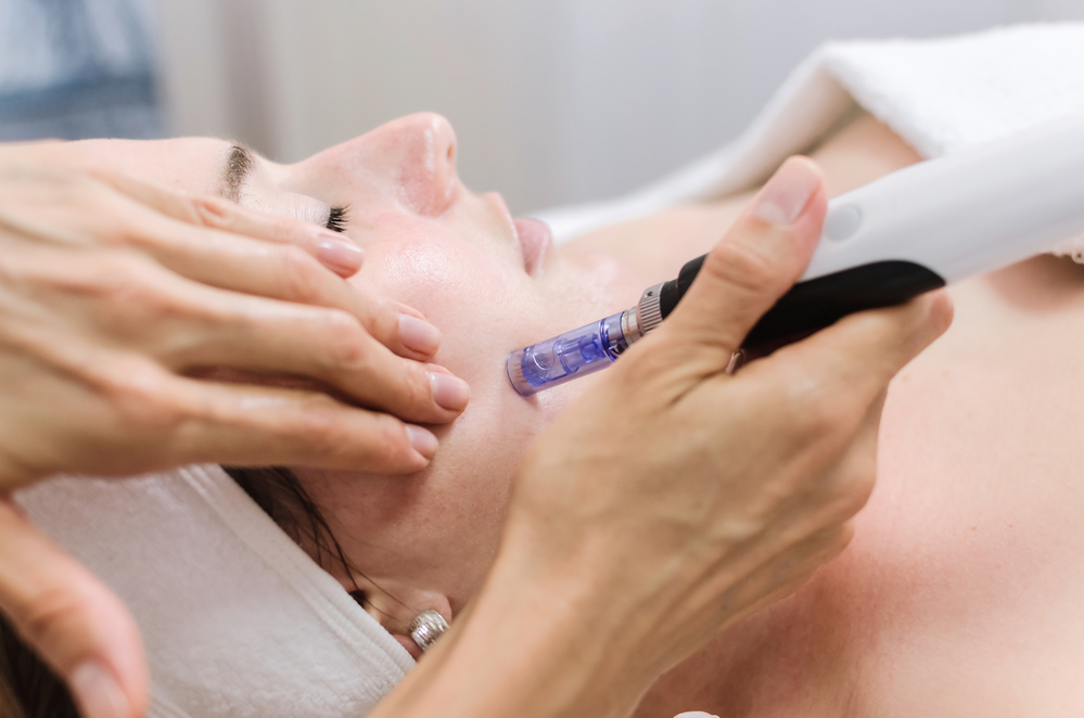 Woman receiving a facial treatment