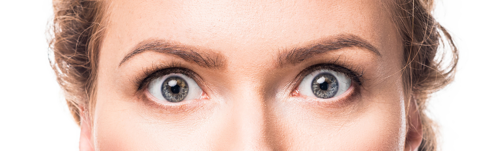Close-up of a woman's eyes wide open