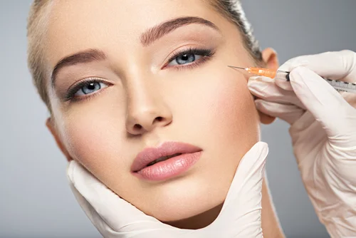 a woman underwent botox and dermal filler treatments